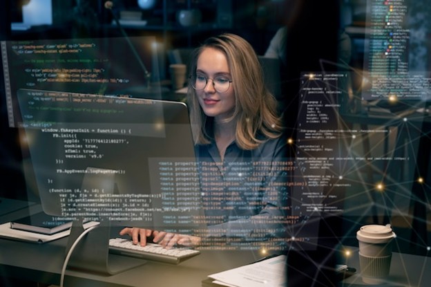 A woman working on a computer with floating lines of code and a digital network overlay, representing cybersecurity, data encryption, and secure software development.