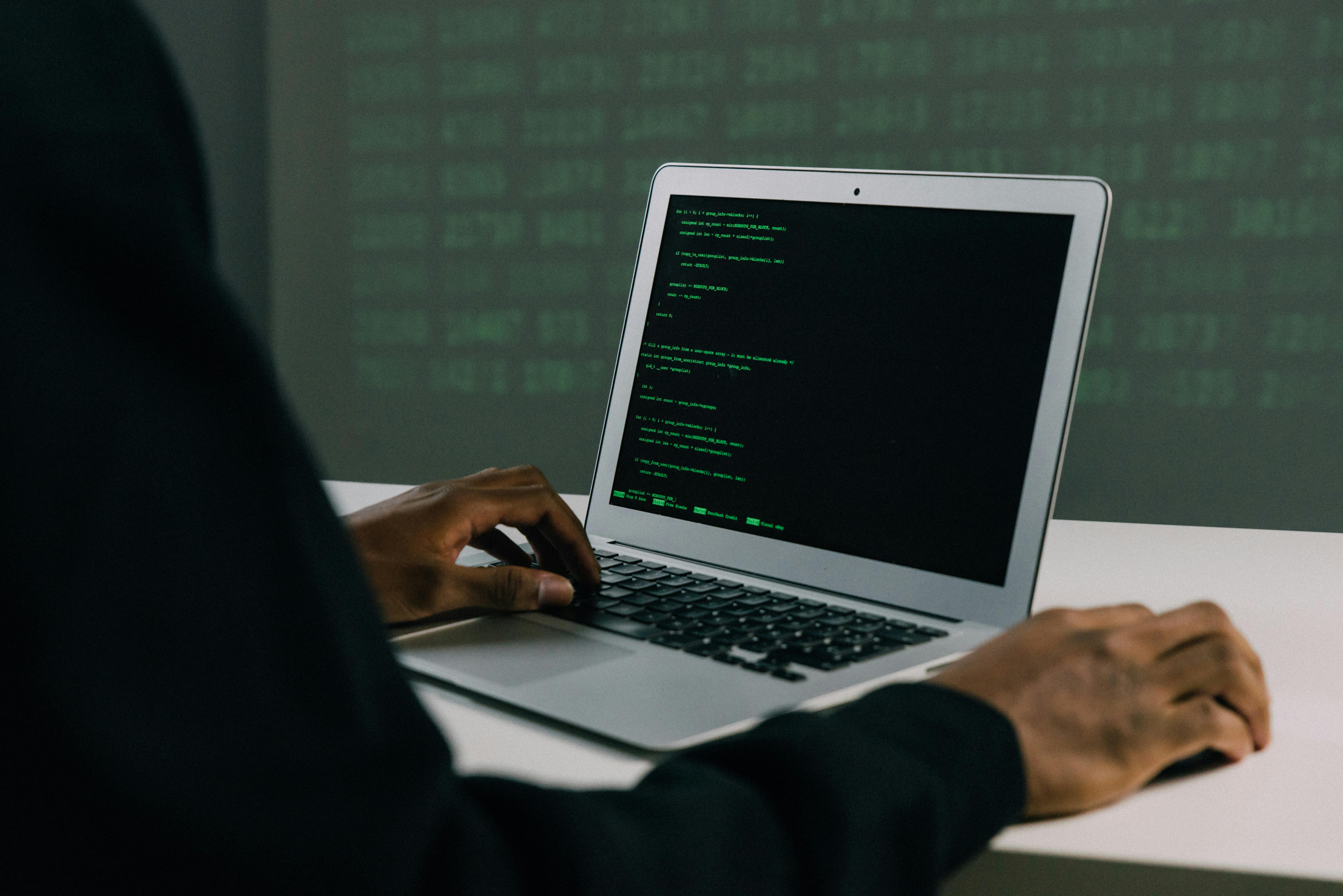 person using macbookair